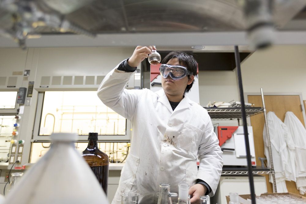 It's 8 p.m. and Jason Zhong '22 is finishing up for the day. Zhong is working on the synthesis of sulfur-based analogues of porphyrins.