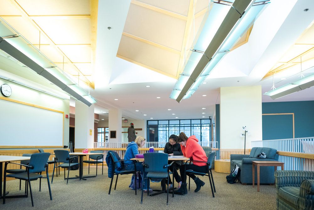 Students studying in an upstairs lounge in the Science Center.
