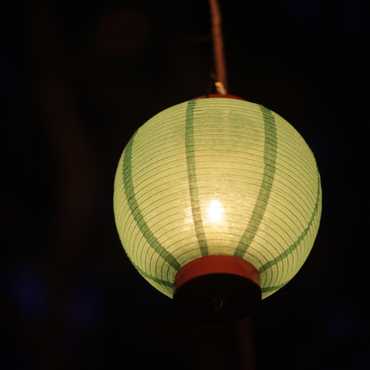 A close-up of a lantern at night