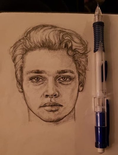 A pencil sketch of a boy