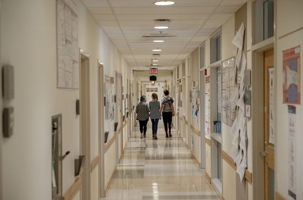 Students walking down the hall.