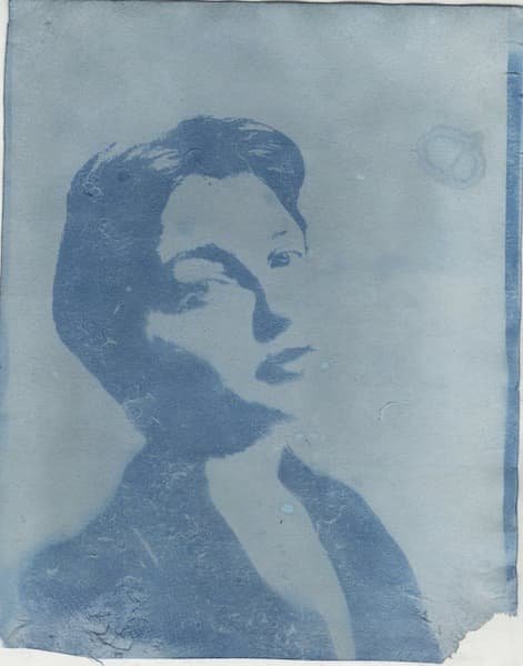 A picture of a woman with her head tilted back.