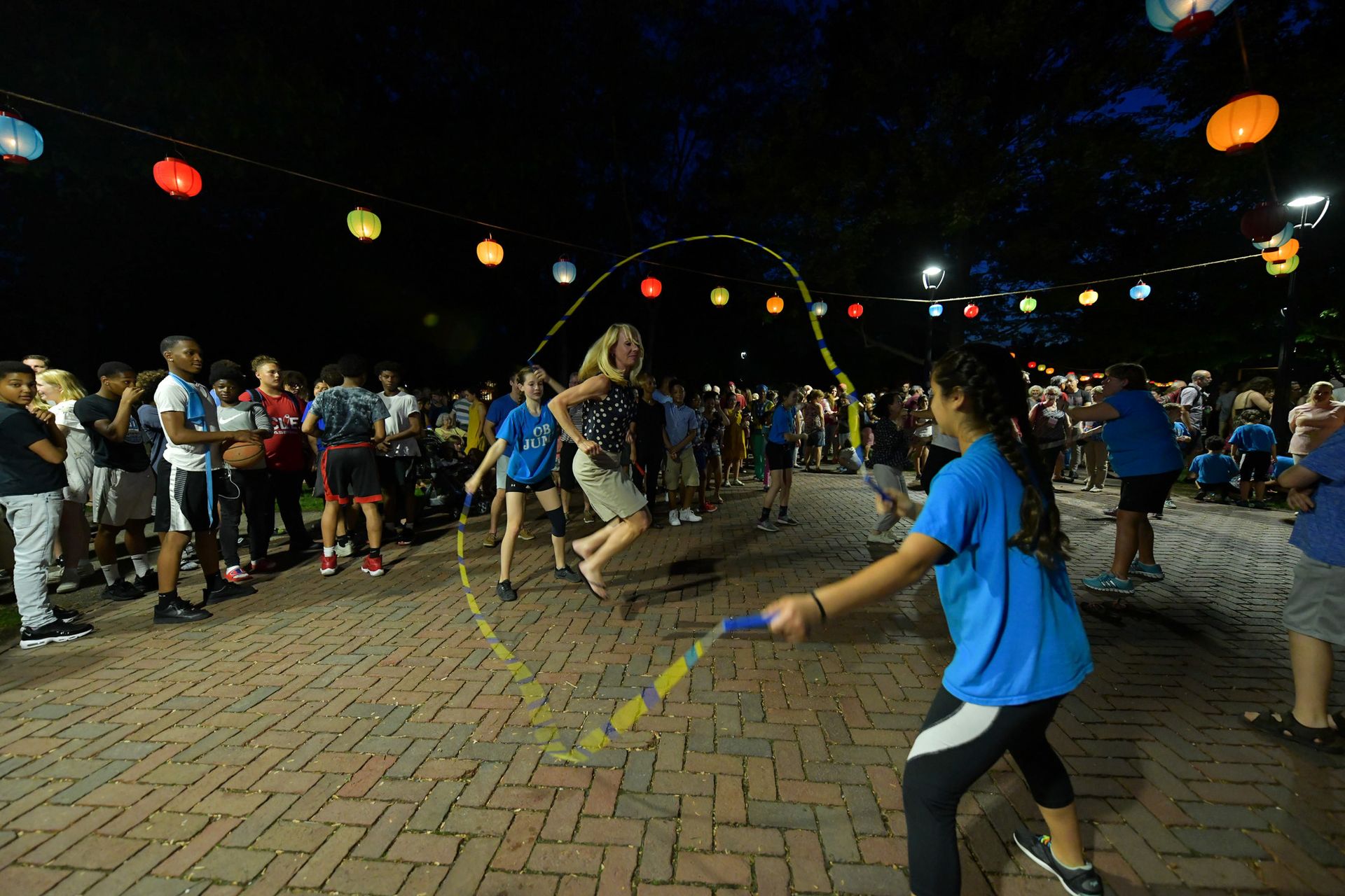 An older woman jumping rope