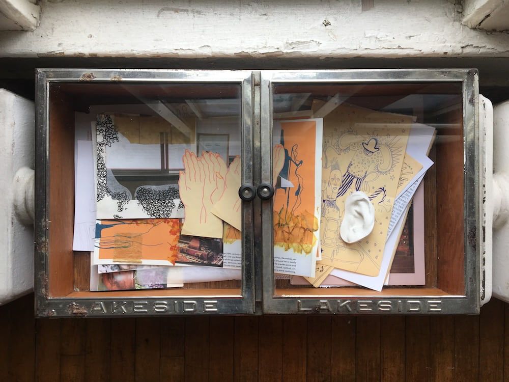 A clear top box with drawings inside