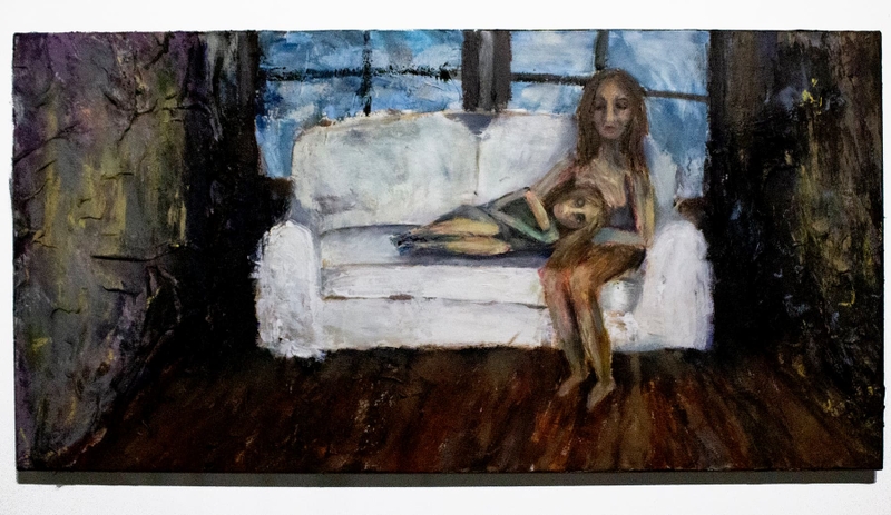 A painting of a woman sitting on a couch with a child laying on her lap.
