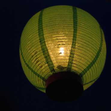 A close-up of a lantern at night