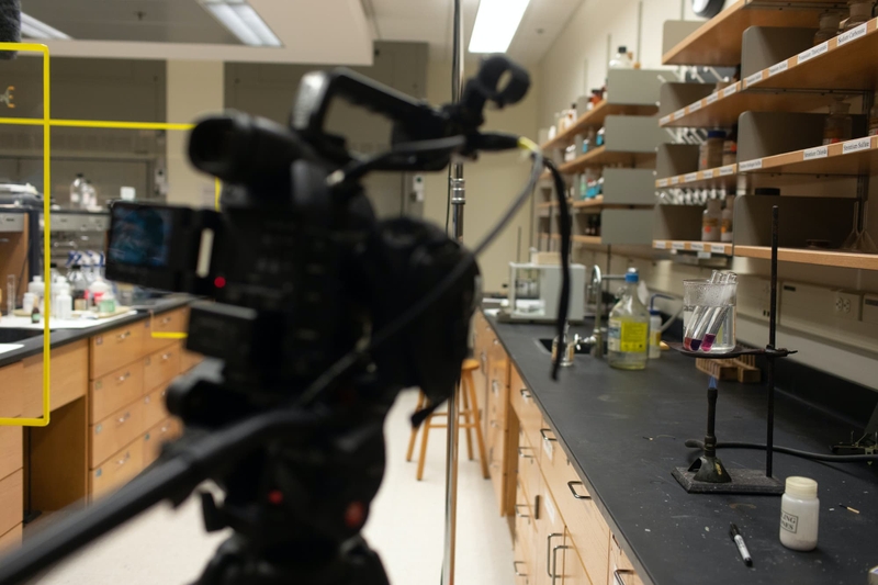 A video camera films a chemistry experiment.
