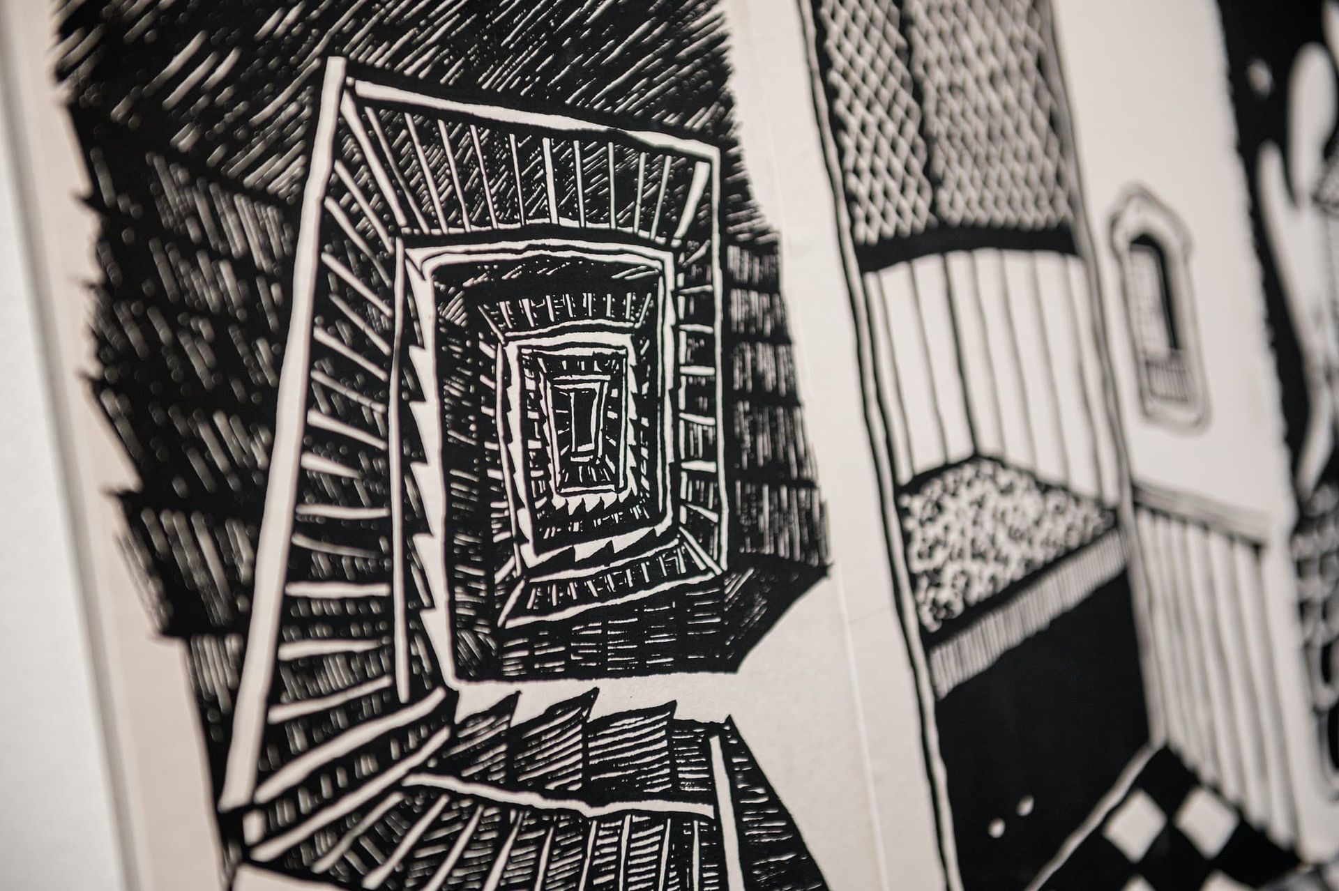 An artist drawing of a winding staircase.