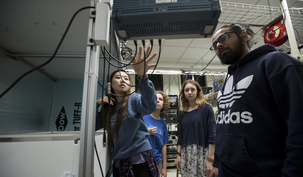 Sun Yool Park ‘19, Claire Segura ‘20, Eleda Fernald ‘22, and Dhruv Tandon ‘22, work on the construction of a SERF co-magnotometer for the Global Network of Optical Magnetometers for Exotic physics (GNOME) in Associate Professor Jason Stalnaker's laser lab.