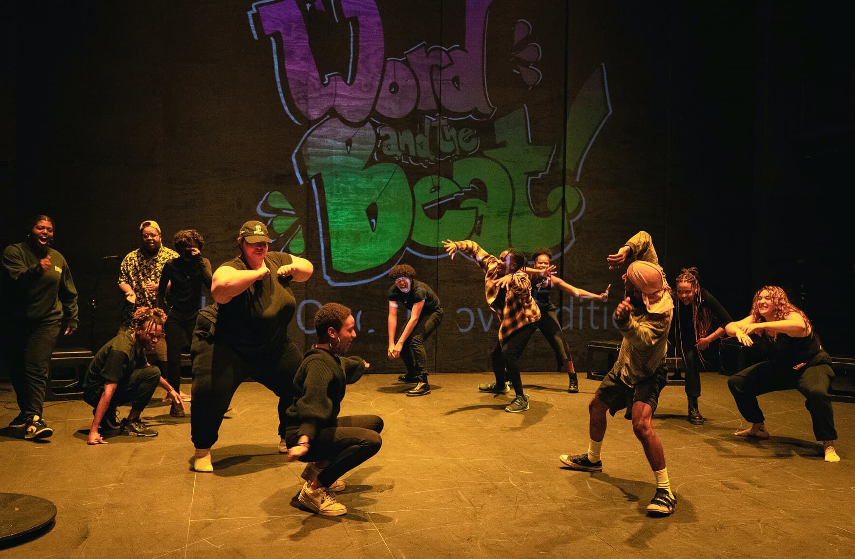 A group students dance in class.