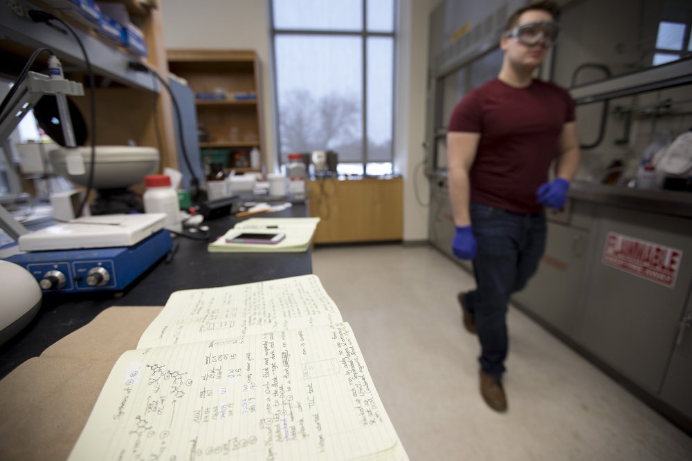 Student wearing goggles in a science lab.