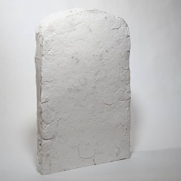 A clay rounded edged square sculpture
