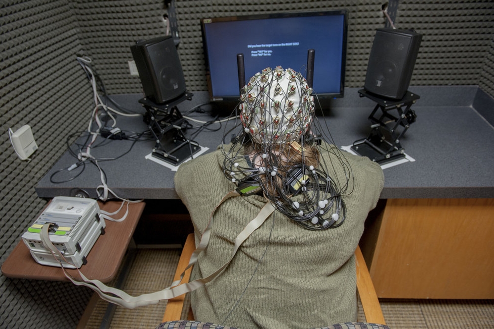 Electroencephalogram (EEG) is also used in Professor of Neuroscience Leslie Kwakye's lab for research on how attention affects multisensory integration and the brain. Information from the experiment is transmitted into an adjoining analysis room and viewed by Lauriel Powell ‘22 and Tawni Hosein ‘22, pictured below.