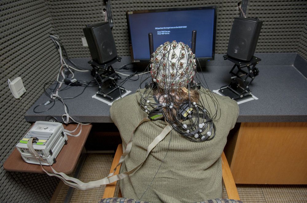 Electroencephalogram (EEG) is also used in Professor of Neuroscience Leslie Kwakye's lab for research on how attention affects multisensory integration and the brain. Information from the experiment is transmitted into an adjoining analysis room and viewed by Lauriel Powell ‘22 and Tawni Hosein ‘22, pictured below.