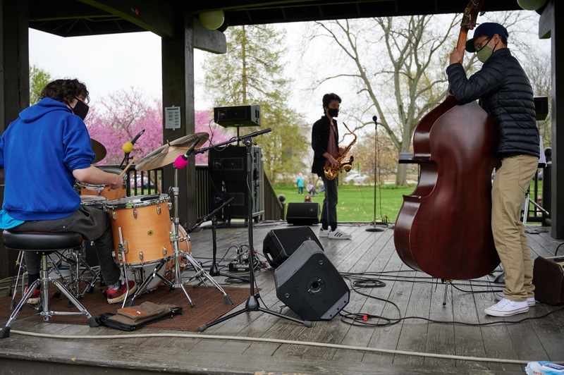 A jazz band performs in a park gazebo.