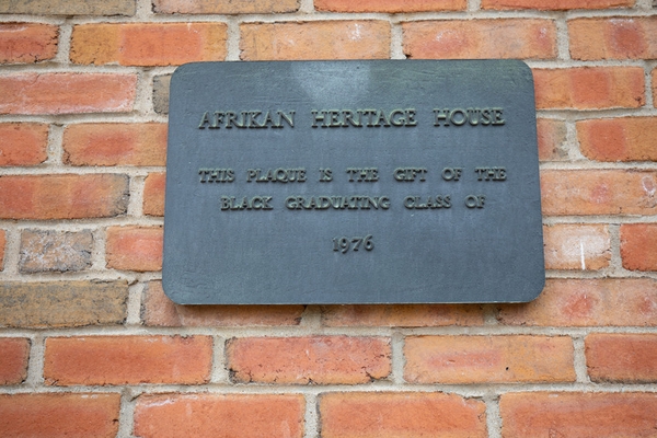 A plaque hanging on an exterior wall of The House given by the Class of 1976.
